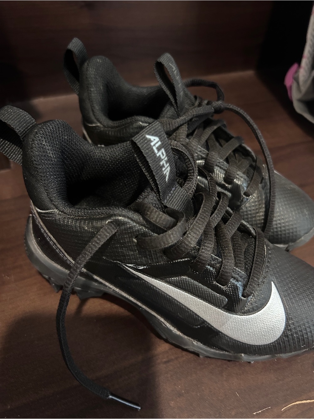 Nike Kids toddler Black Football Cleats with Silver Swoosh